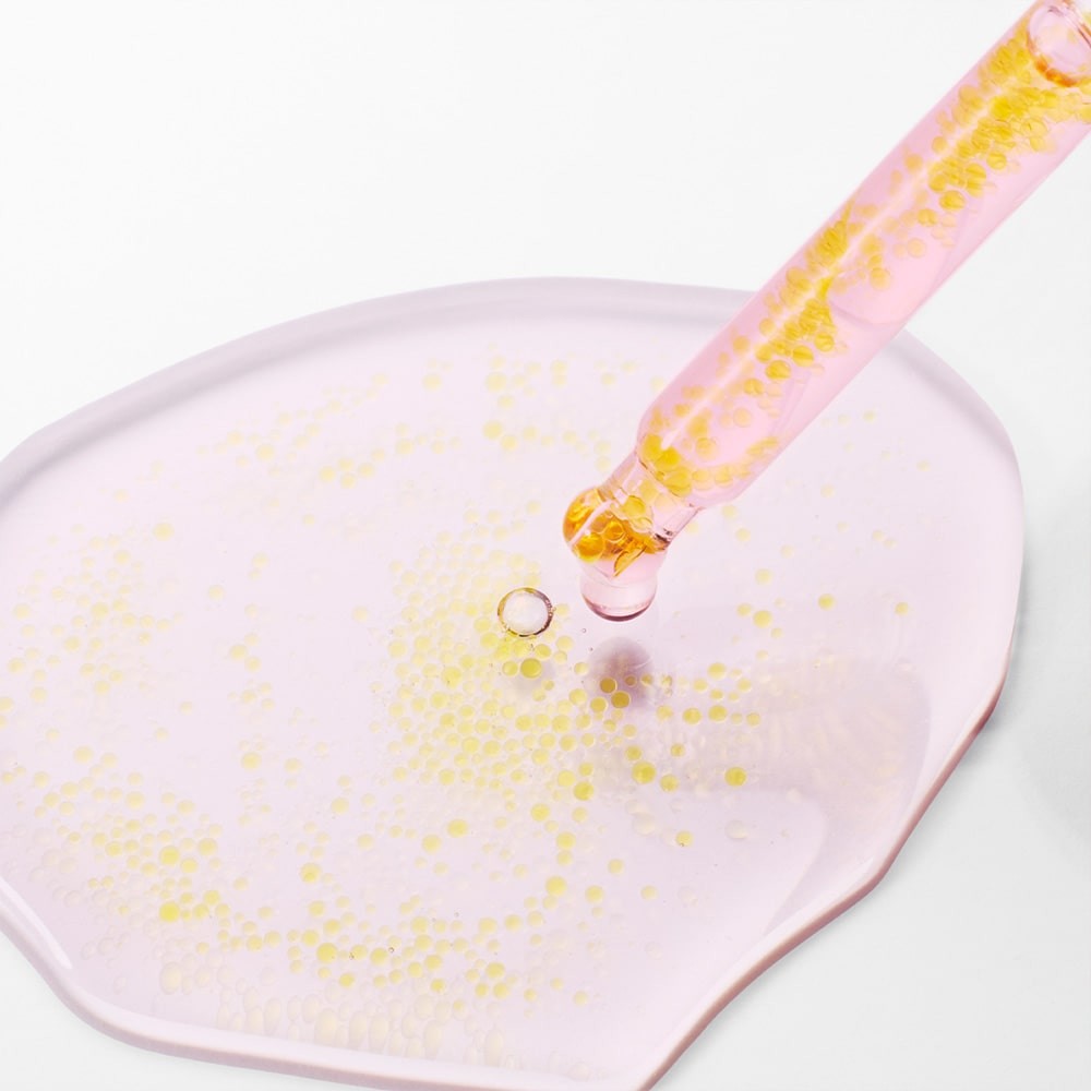 Purito Seoul TXA 6 Niacinamide 10 Retinal Serum droplets