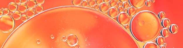 Red bubble lipids under microscope on orange background