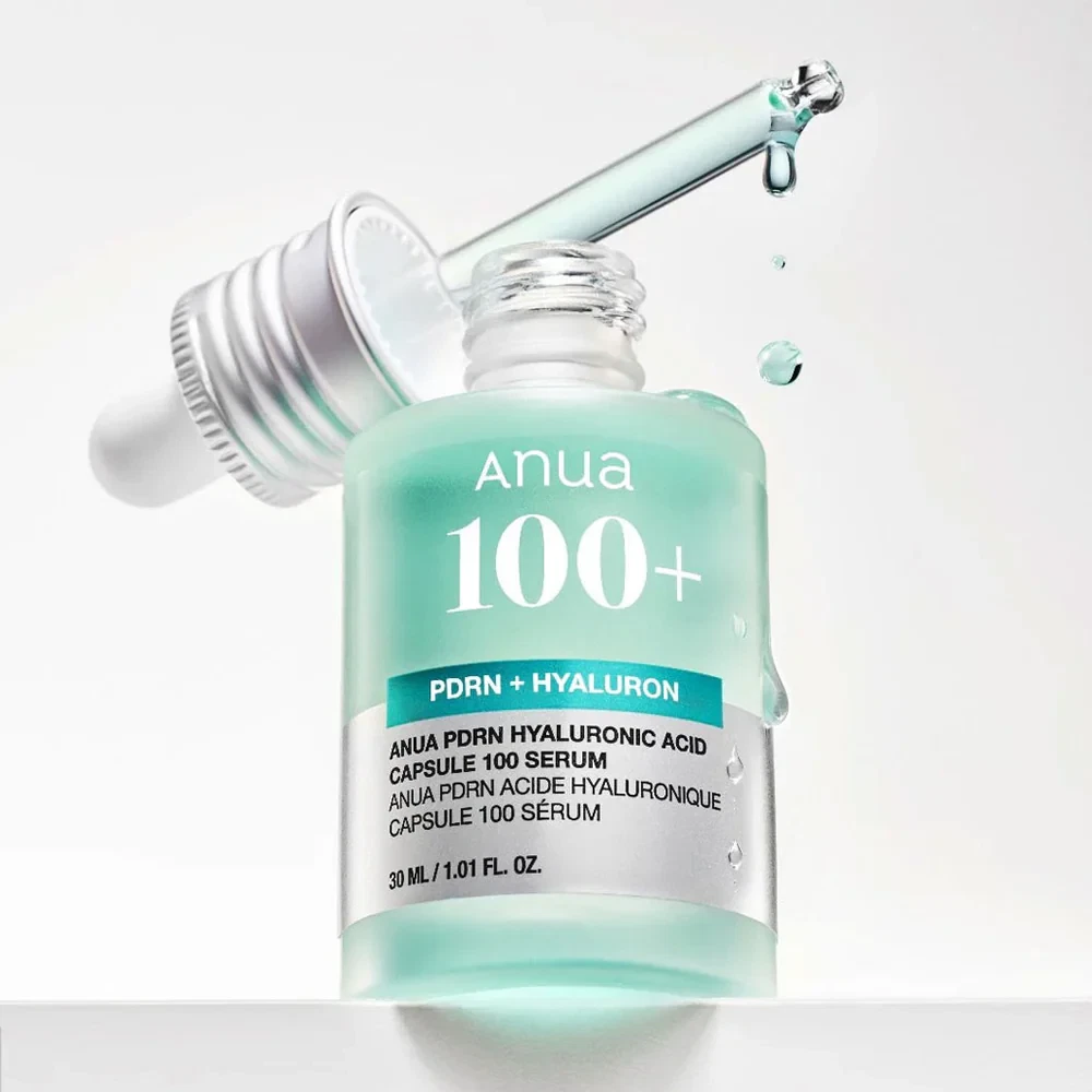 Anua 100 PDRN and Hyaluron serum with applicator dripping neon blue serum down side