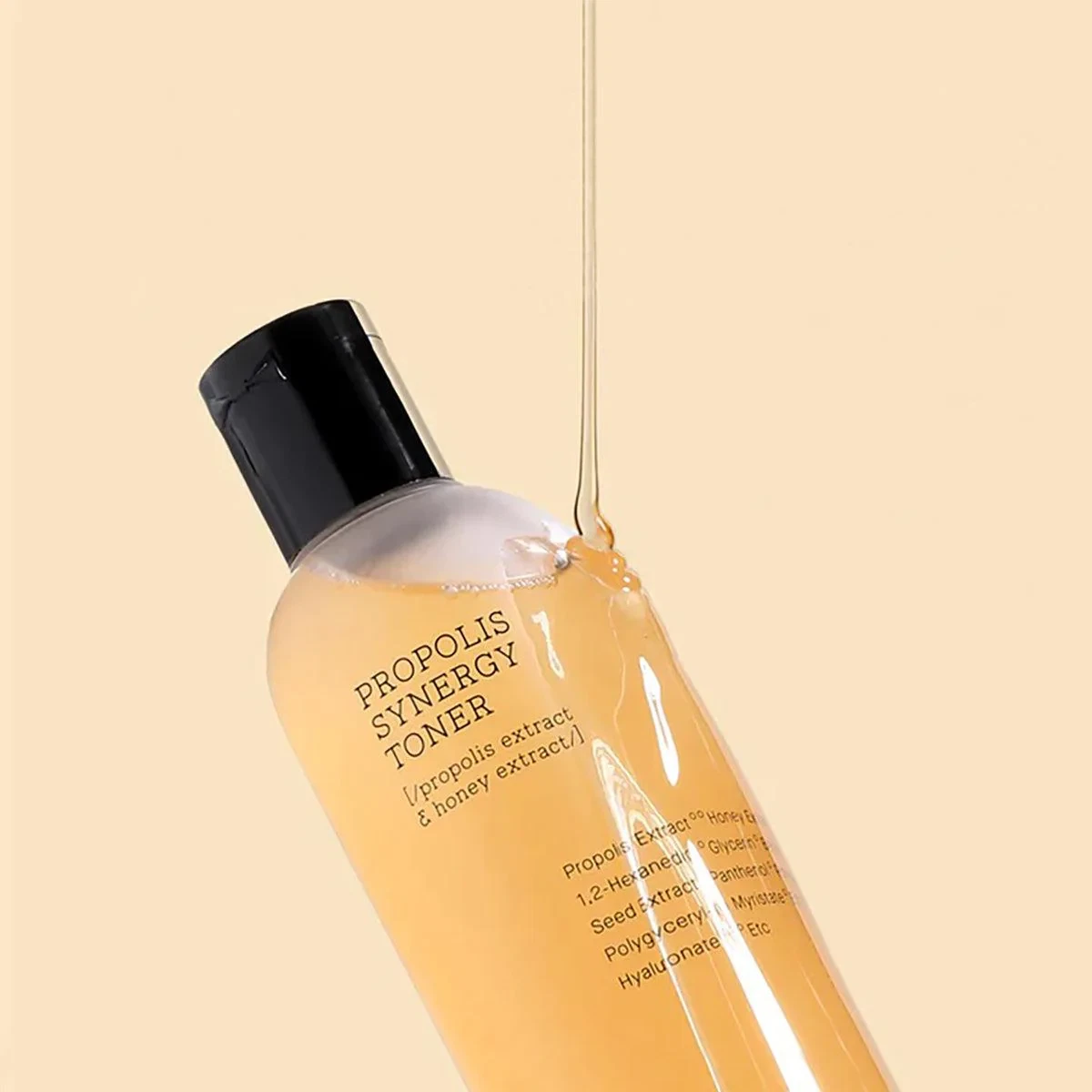Cosrx Propolis Synergy Toner being covered in honey