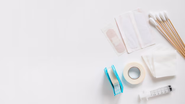Assortment of medical dressing materials on white background