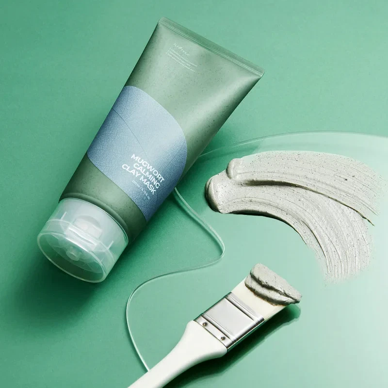 Isntree Mugwort Calming Clay Mask on an art palette