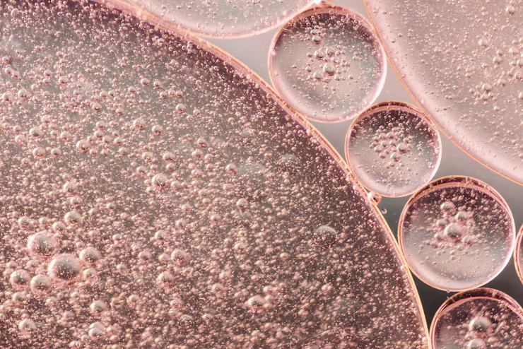 Dense lipid bubbles on pink background creating separated effect