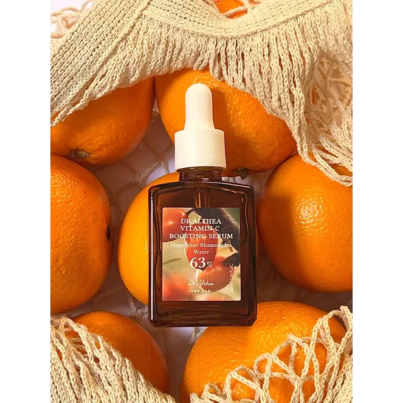 Dr Althea Vitamin C Boosting Serum in bag of oranges