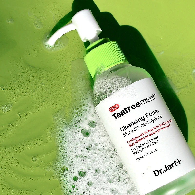 Dr Jart+ Teatreement Cleansing Foam 120ml lying in a green-tinted bath