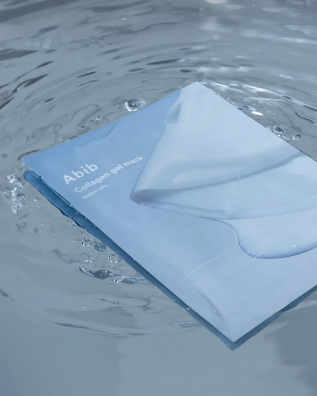 Abib Collagen Gel Mask lying in a pool of water