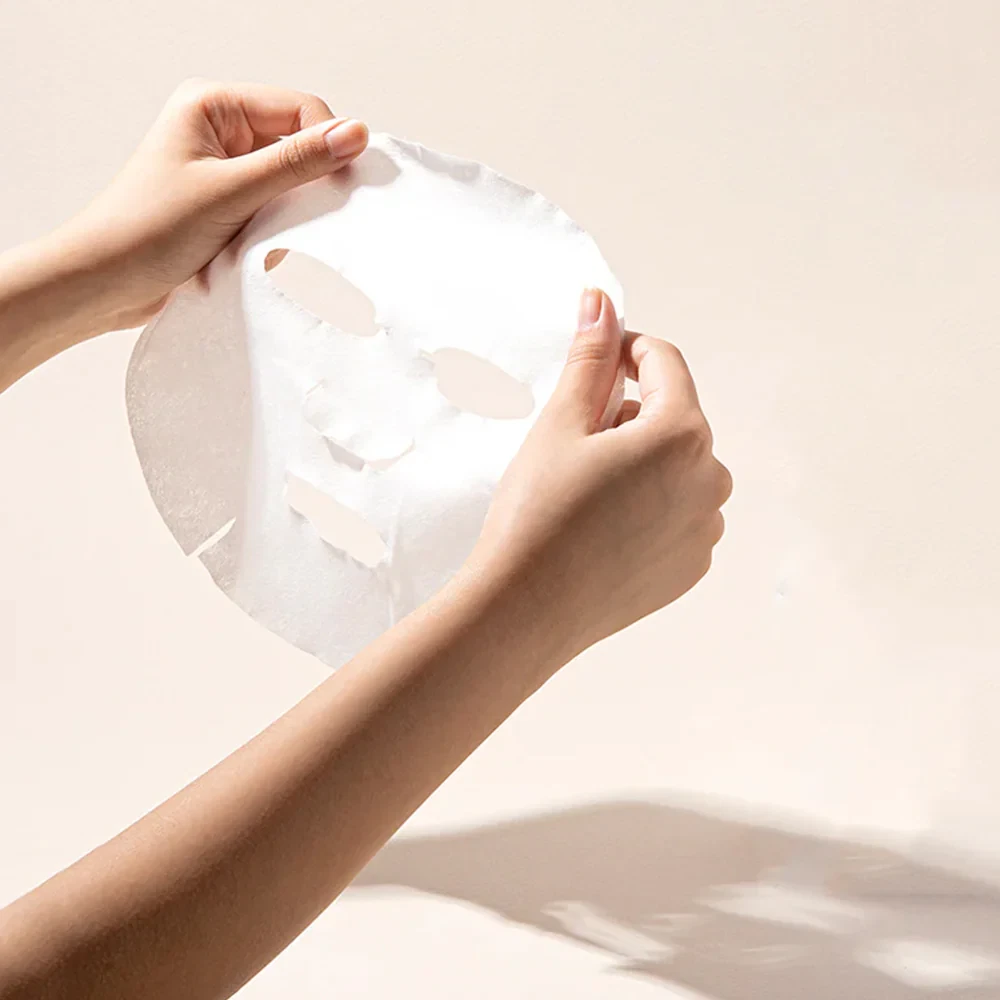 Mary&May Collagen Peptide Vital Mask being held by model