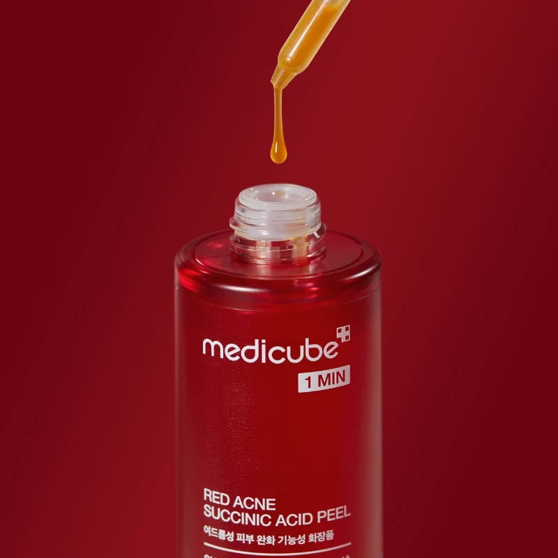 Medicube Red Acne Succinic Acid Peel bottle with drop of golden serum