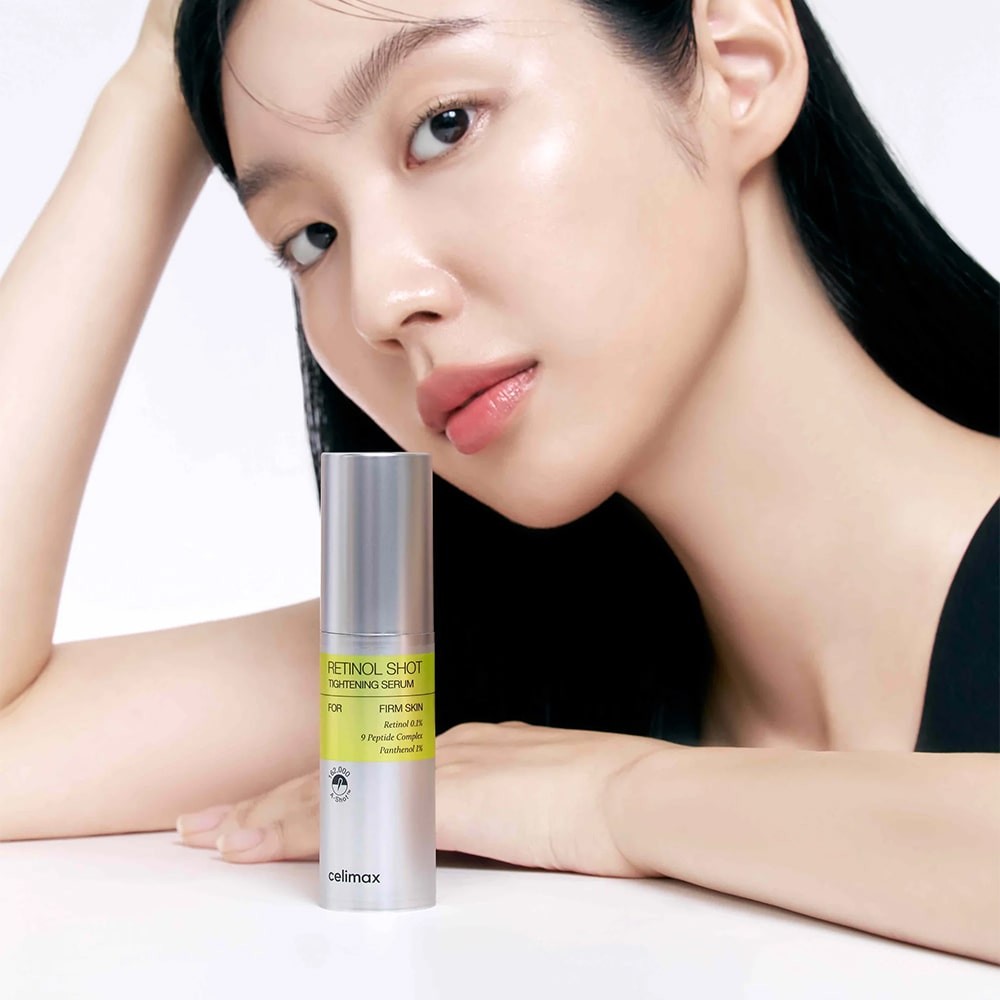 Model sitting with Celimax Vita-A Retinol Shot Tightening Serum