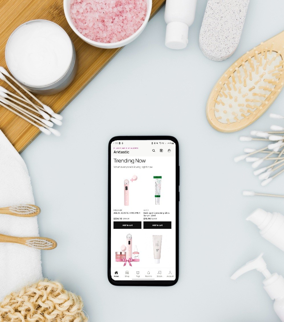 Arktastic App Open on Phone with Bath Products