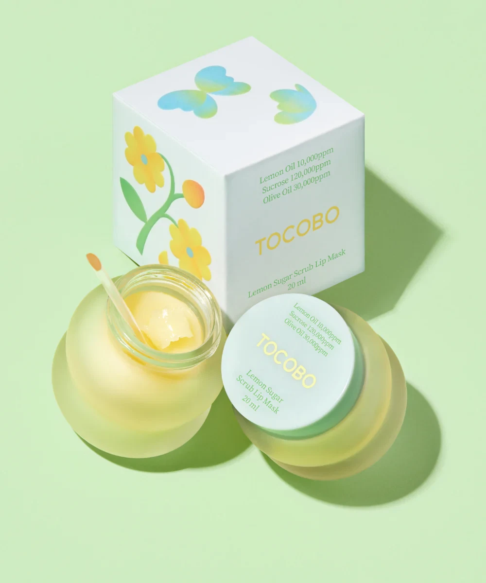 Tocobo Lemon Sugar Scrub Lip Mask sitting in front of box with open lid and applicator