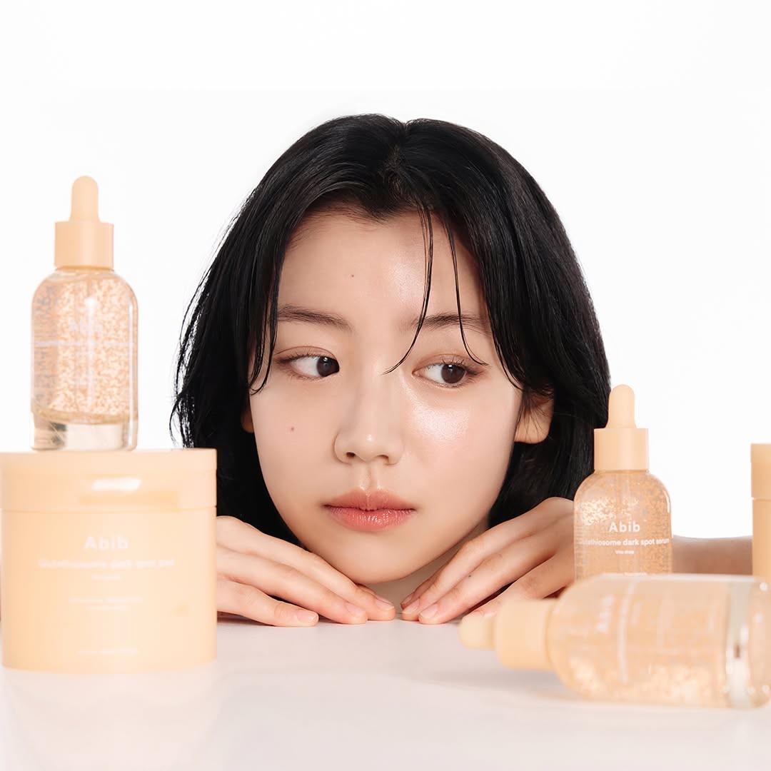Abib Glutathione Dark Spot Skincare Range with Model