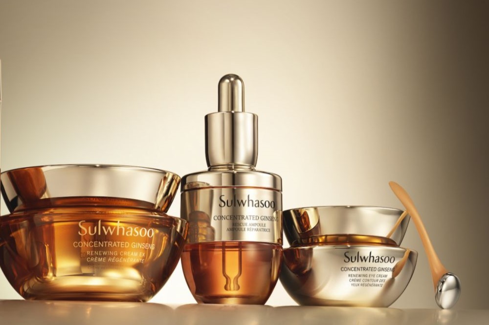 Sulwhasoo traditional Korean beauty products, Concentrated Ginseng line with Serum, ampoule and eye cream in dramatic lighting.