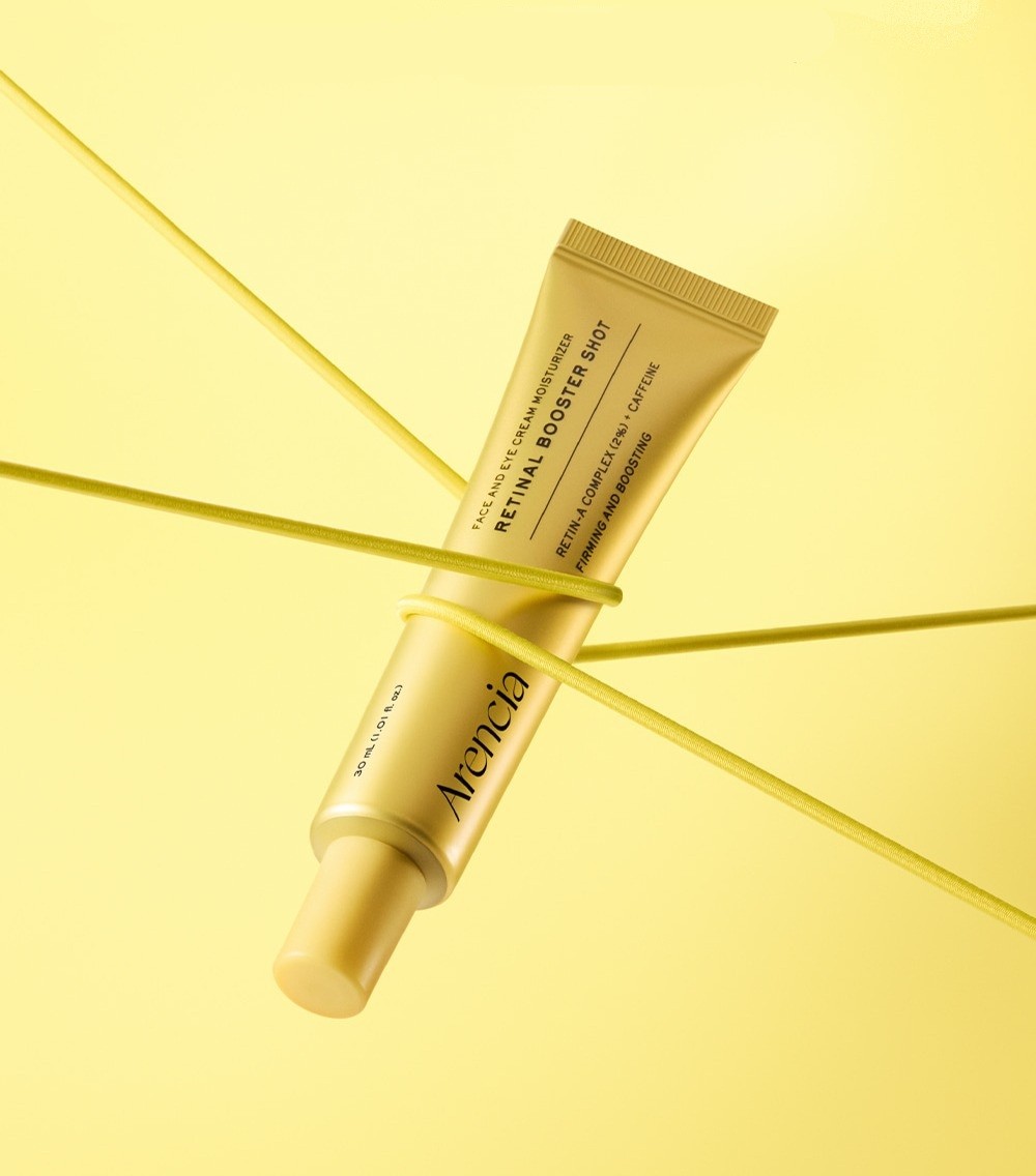 Arencia Retinal Booster Shot suspended by golden thread