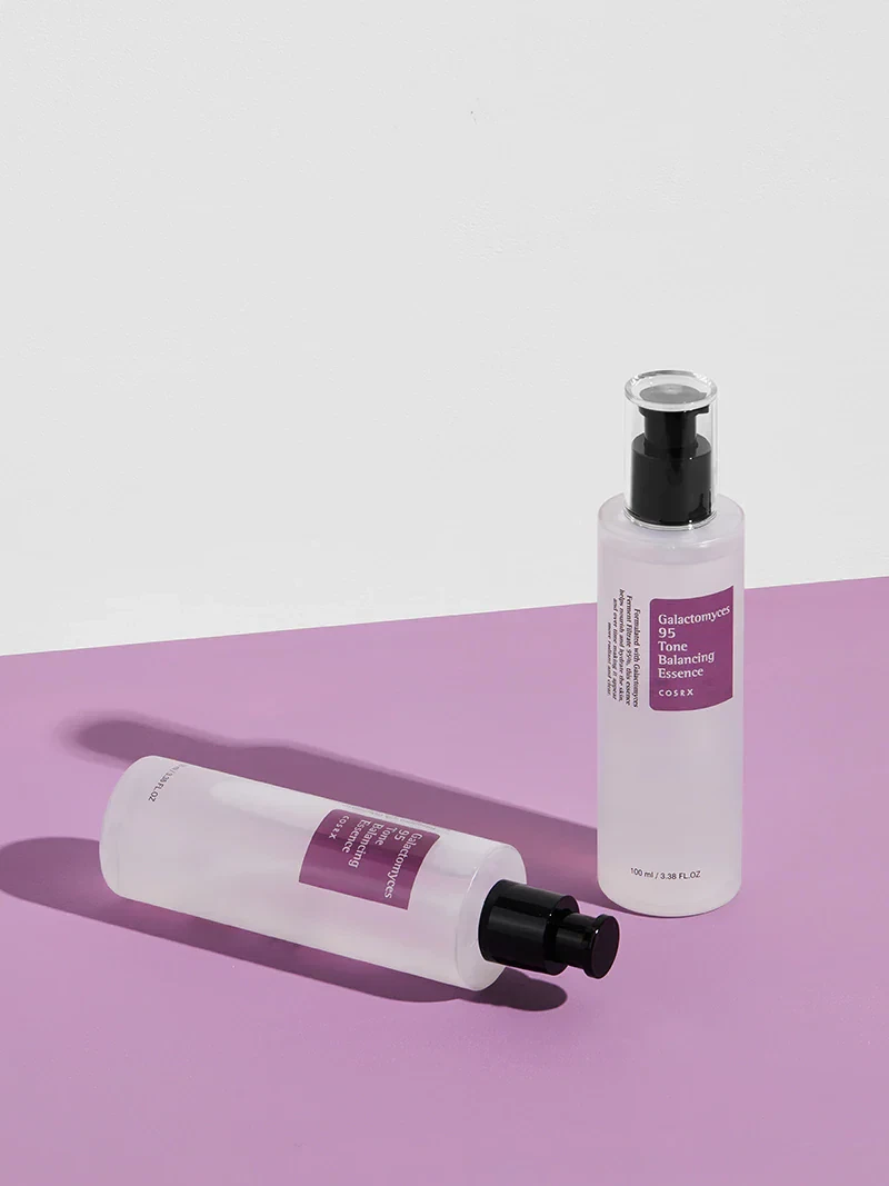 Cosrx Galactomyces 95 Tone Balancing Essence bottles in purple background
