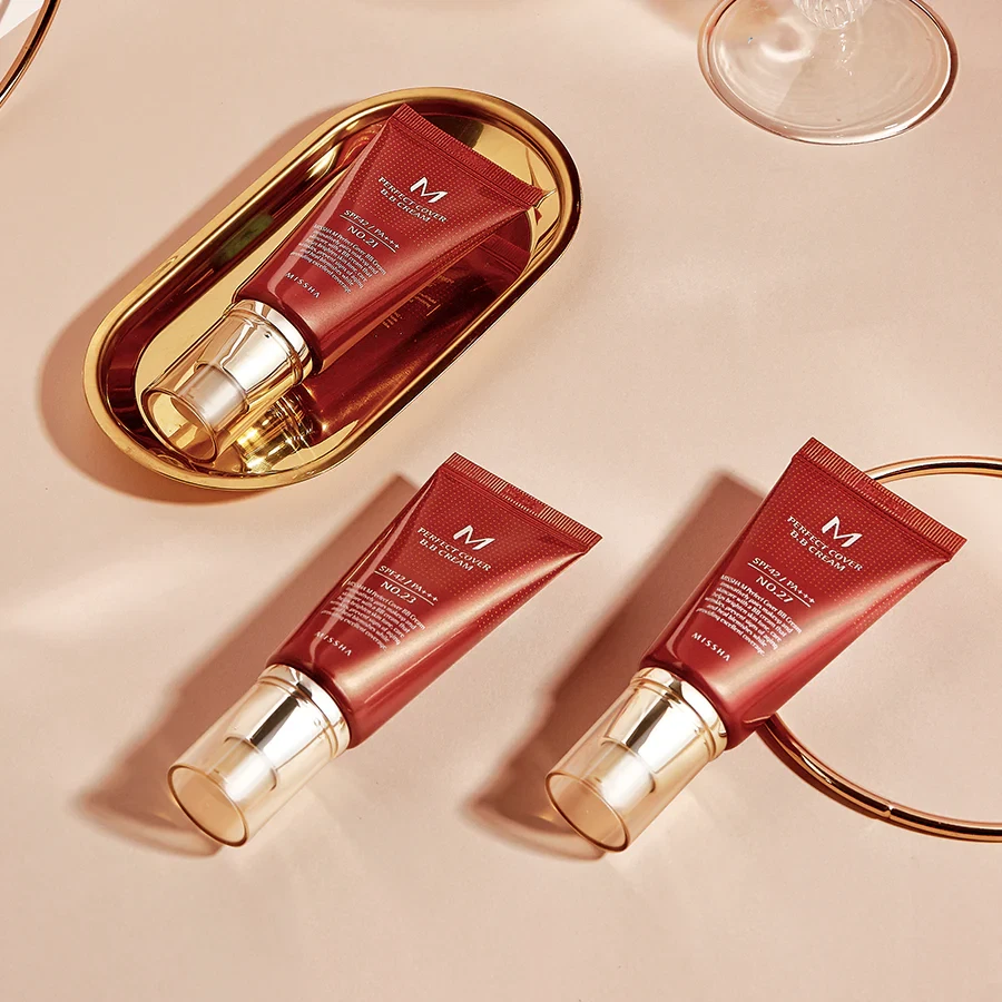 Missha Perfect Cover BB Cream set sitting on golden background