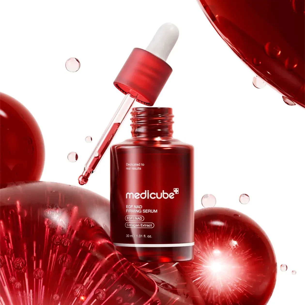 Medicube EGF NAD+ Firming Serum surrounded by bubbles