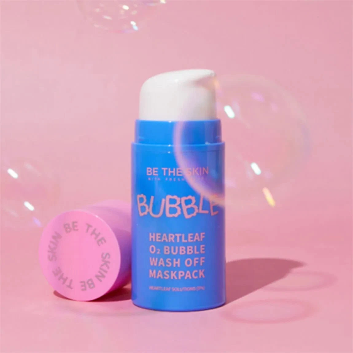 Be The Skin Heartleaf O2 Bubble Wash Off Maskpack in a pink, bubble-filled background
