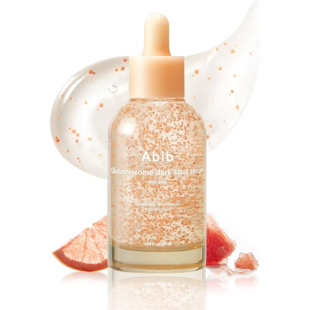 Abib Glutathiosome Dark Spot Serum Vita Drop with Swirl of Clear Serum and Small Cuts of Grapefruit