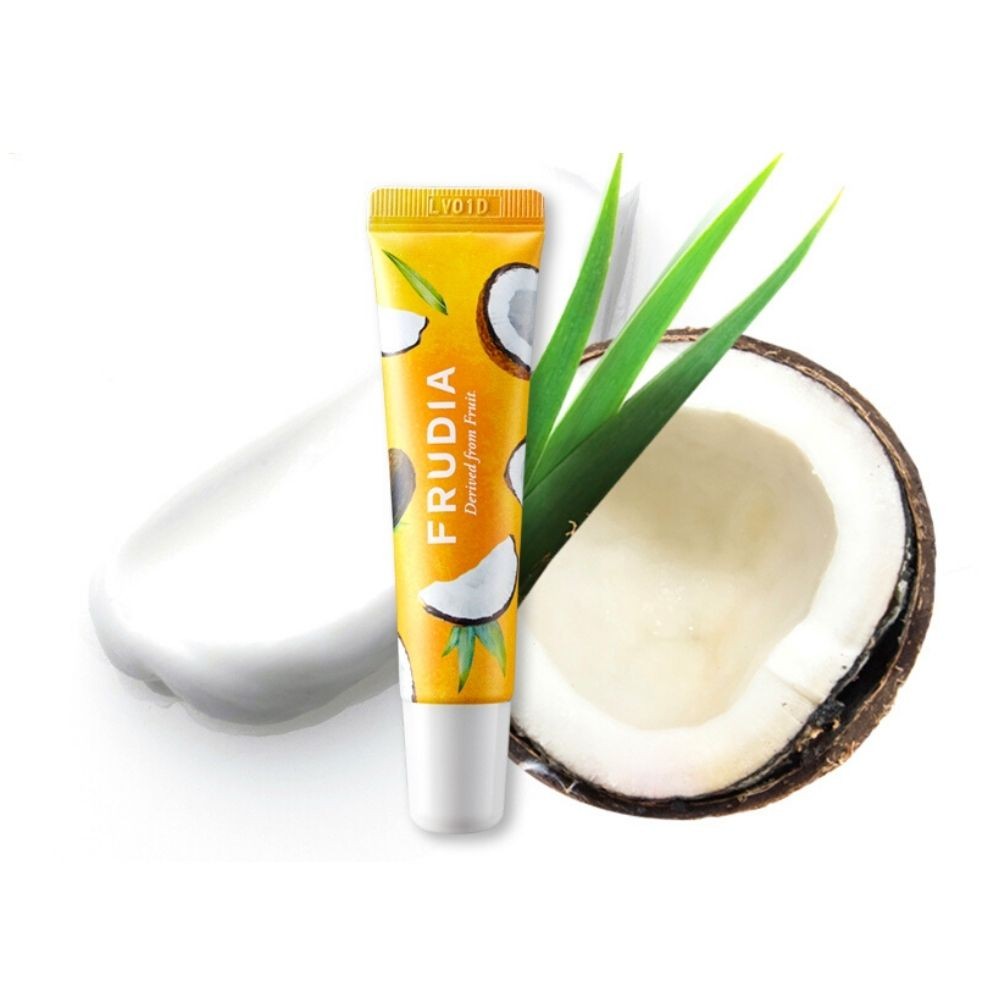 Frudia Coconut Honey Salve Lip Cream leaning on fresh coconut on white background