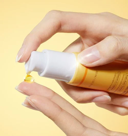 Medicube Kojic Acid Turmeric Vita Eye Gel Serum being held