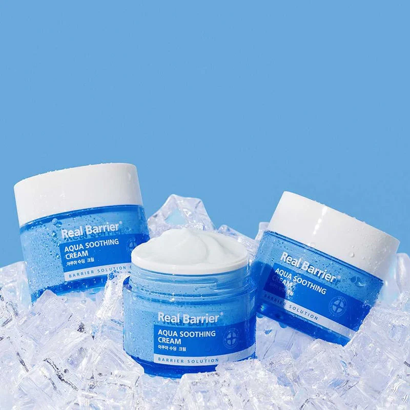 Real Barrier Aqua Soothing Cream trio sitting on ice.