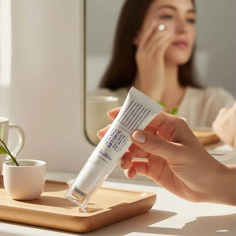 Dr Althea Retinol Flat Iron Eye Roller with model