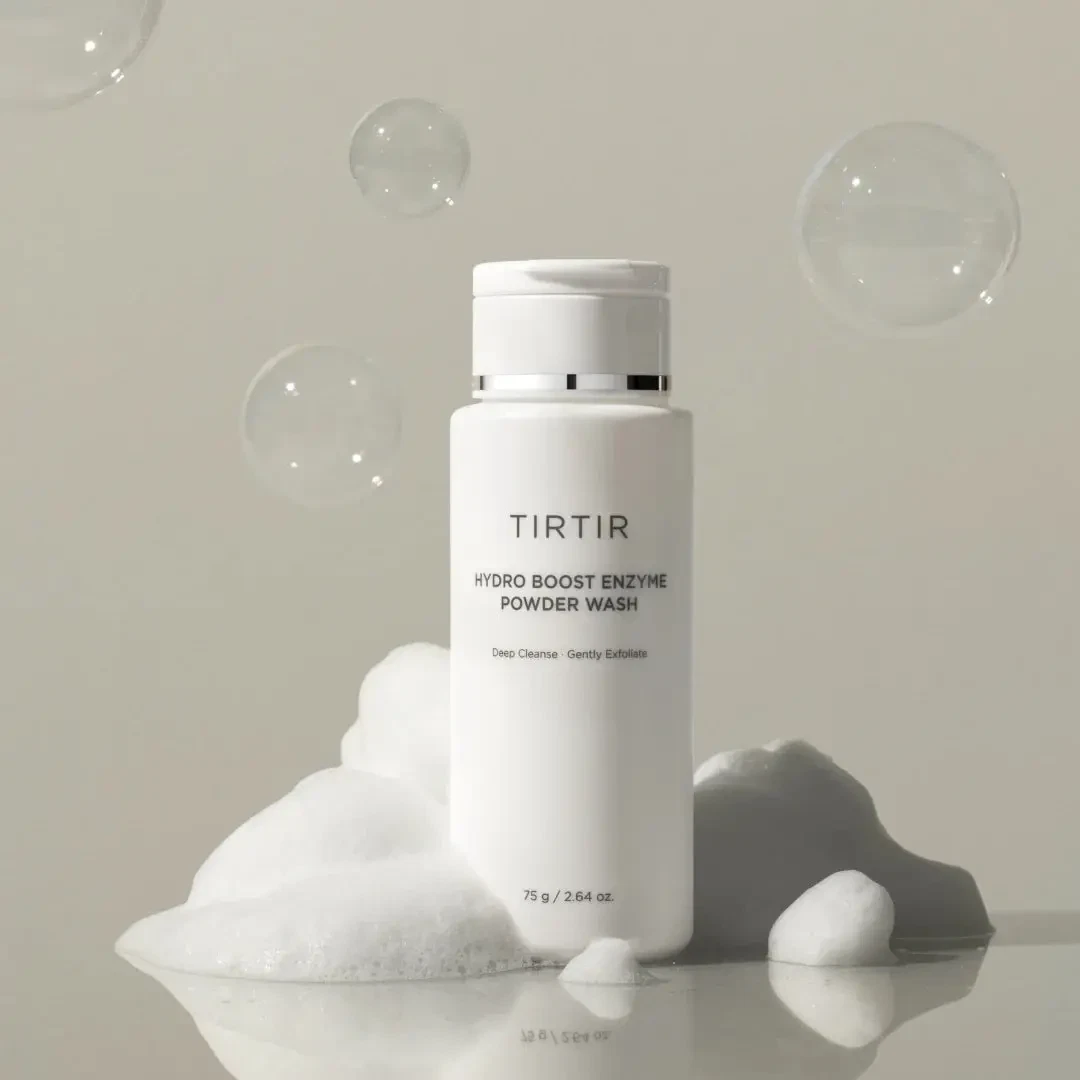 TIRTIR Hydro Boost Enzyme Powder Wash bottle surrrounded by bubble bath and free bubbles