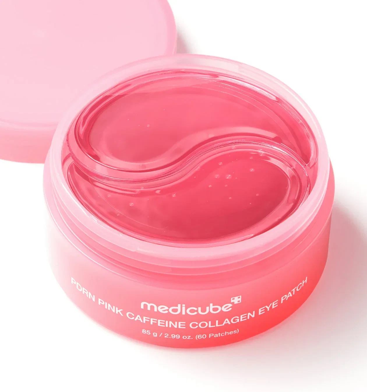Medicube PDRN Pink Caffeine Collagen Eye Patch jar showing rose-pink hydrogel