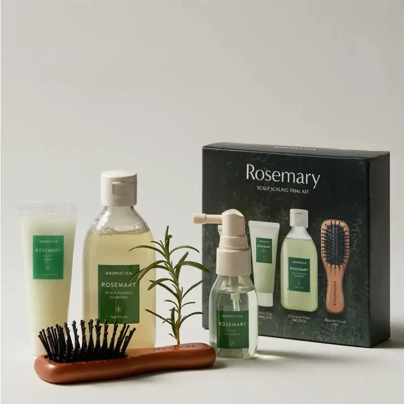 Aromatica Rosemary Scalp Scaling Trial Kit with sprig of rosemary